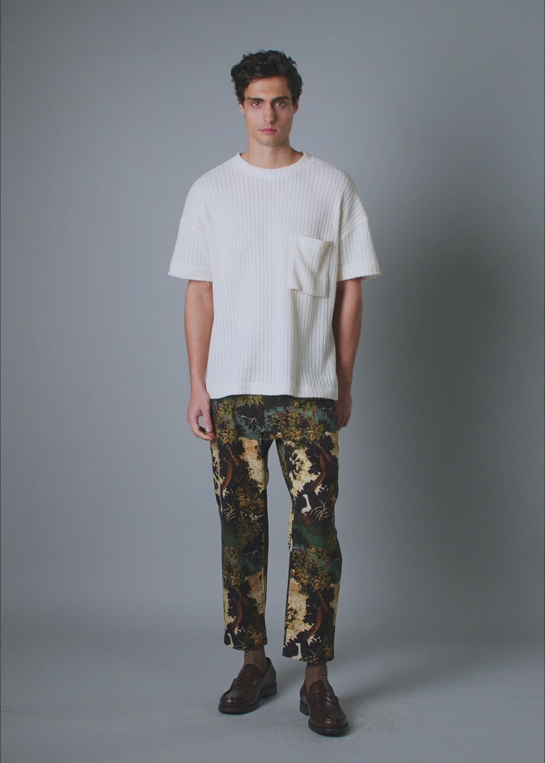 Men’s vacation pant with bold tapestry print – Resortwear fashion capturing the White Lotus effect